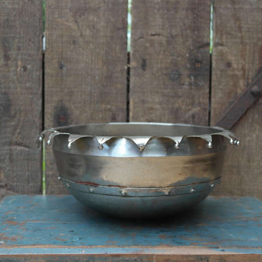 Vintage brutalist riveted metal bowl