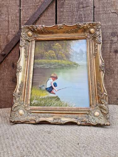 Boy fishing framed oil on canvas