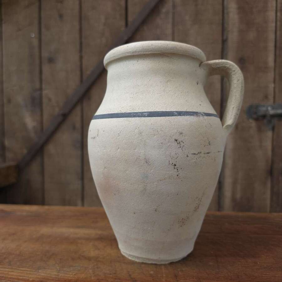 Rustic clay jug