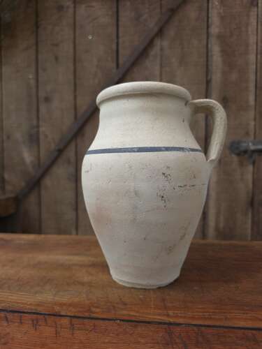 Rustic clay jug