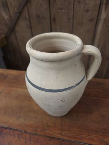 Rustic clay jug