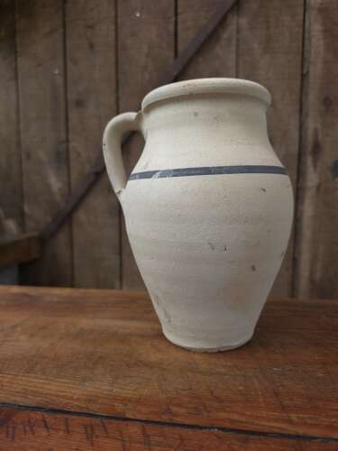Rustic clay jug