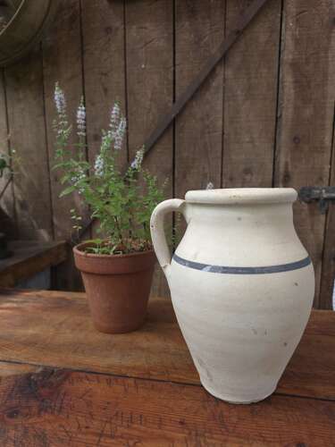 Rustic clay jug