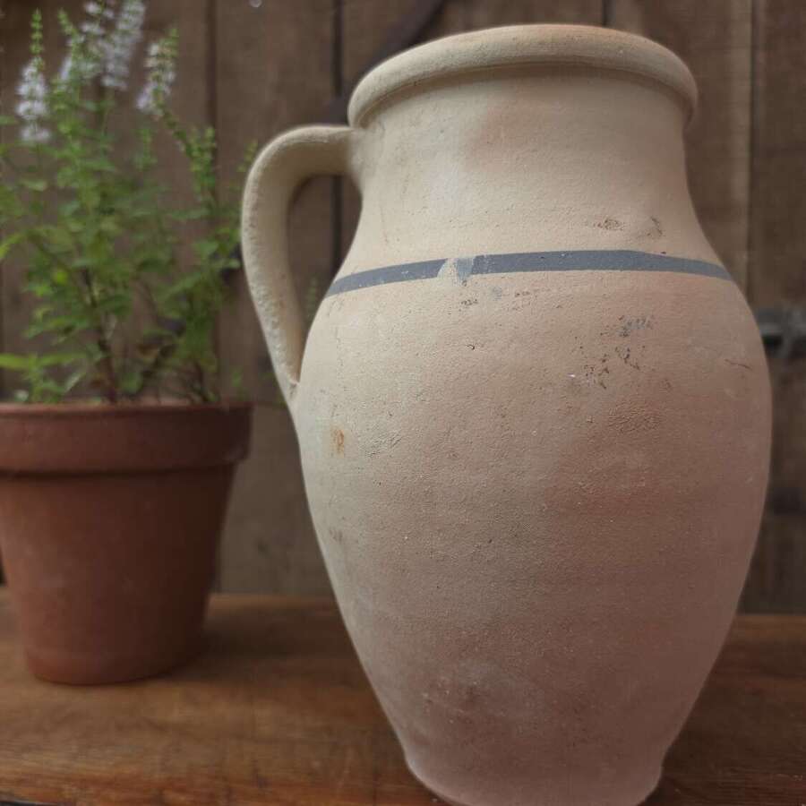 Rustic clay jug