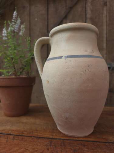 Rustic clay jug