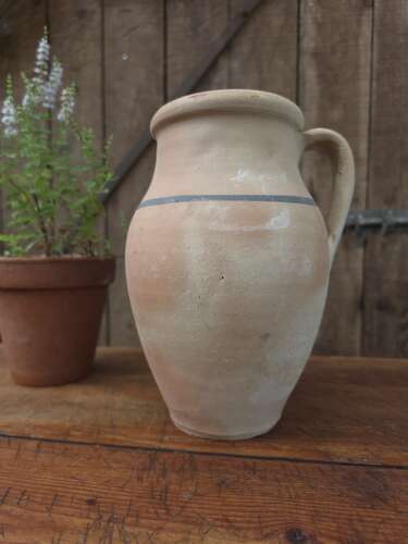 Rustic clay jug