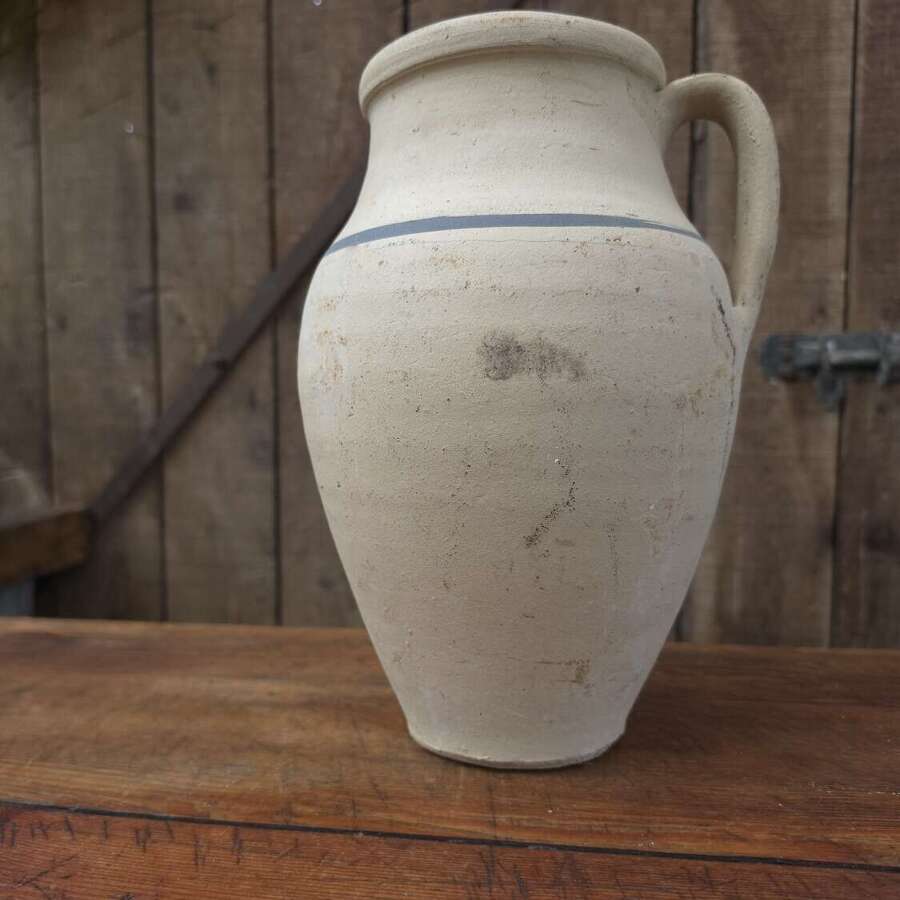 Rustic clay jug