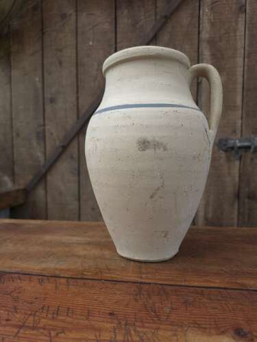 Rustic clay jug
