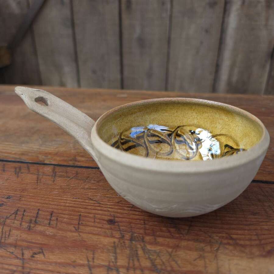 Handmade Cricklade pottery pouring bowl with leaf decoration