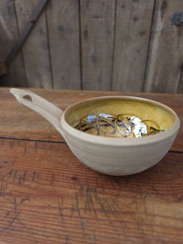 Handmade Cricklade pottery pouring bowl with leaf decoration