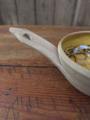 Handmade Cricklade pottery pouring bowl with leaf decoration