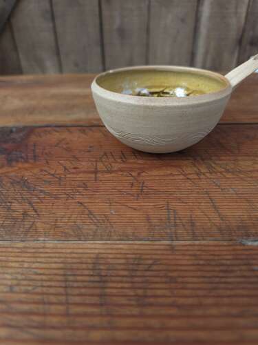 Handmade Cricklade pottery pouring bowl with leaf decoration