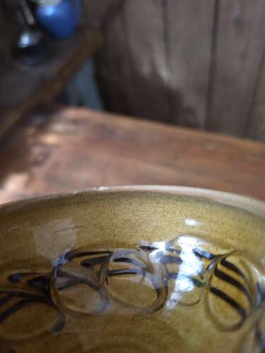 Handmade Cricklade pottery pouring bowl with leaf decoration