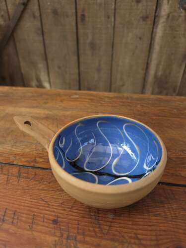 Handmade Cricklade pottery pouring bowl in rich blue glaze