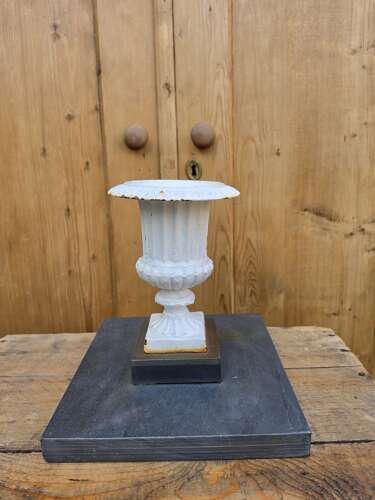Vintage cast iron urn on slate base