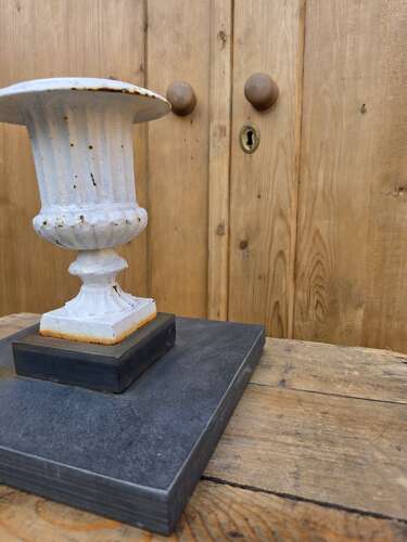 Vintage cast iron urn on slate base