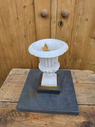 Vintage cast iron urn on slate base