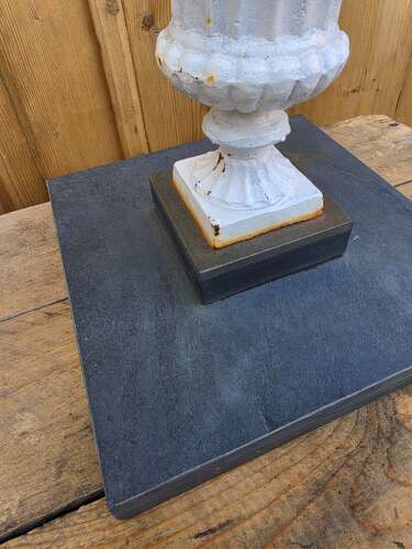 Vintage cast iron urn on slate base