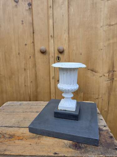 Vintage cast iron urn on slate base