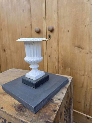 Vintage cast iron urn on slate base