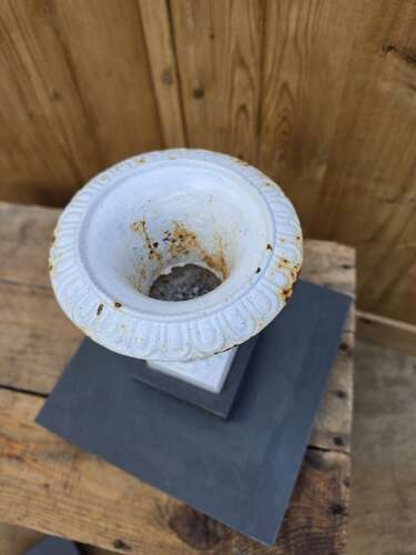 Vintage cast iron urn on slate base