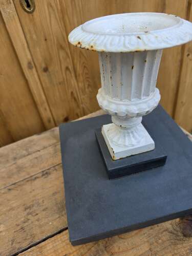Vintage cast iron urn on slate base