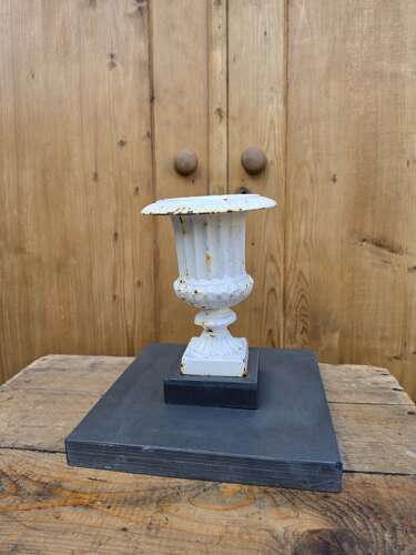 Vintage cast iron urn on slate base
